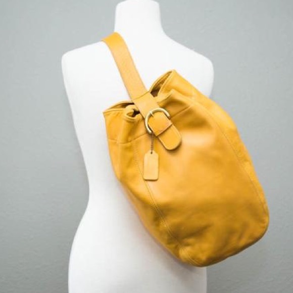 Coach Handbags - Coach Mustard Leather Backpack